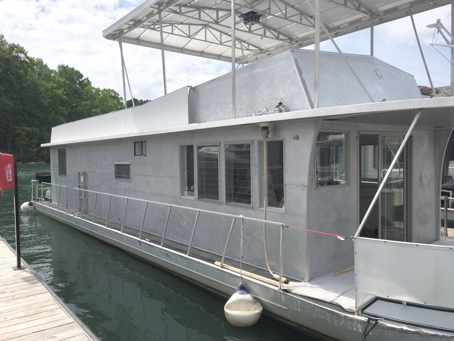 Houseboat exterior before marine work